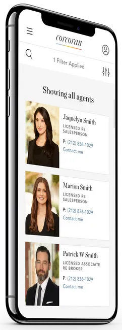 image of a phone with the corcoran website on it.